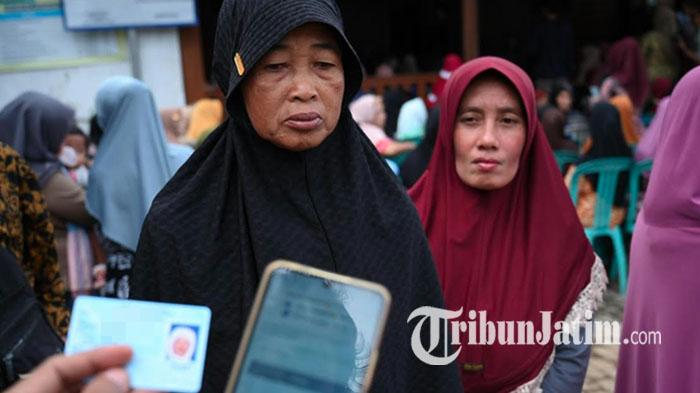Ilustrasi pengecekan bantuan sosial PKH dan BPNT Juli 2026 secara mandiri lewat HP.
