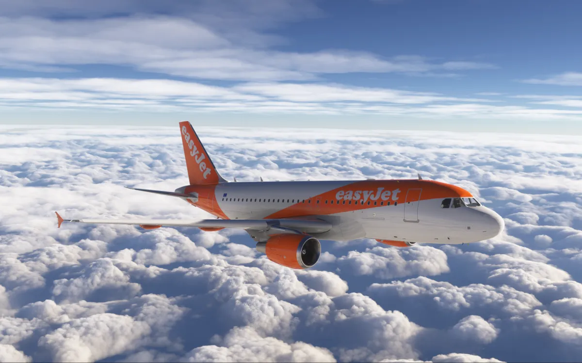 Pesawat maskapai EasyJet terbang di udara sebagai ilustrasi akuisisi oleh Apollo Global Management