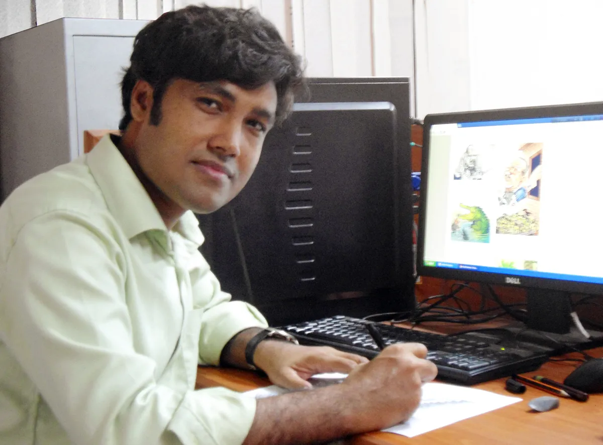 Khalil Rahman, kartunis politik terkemuka asal Bangladesh yang dikenal melalui karya-karyanya di surat kabar nasional
