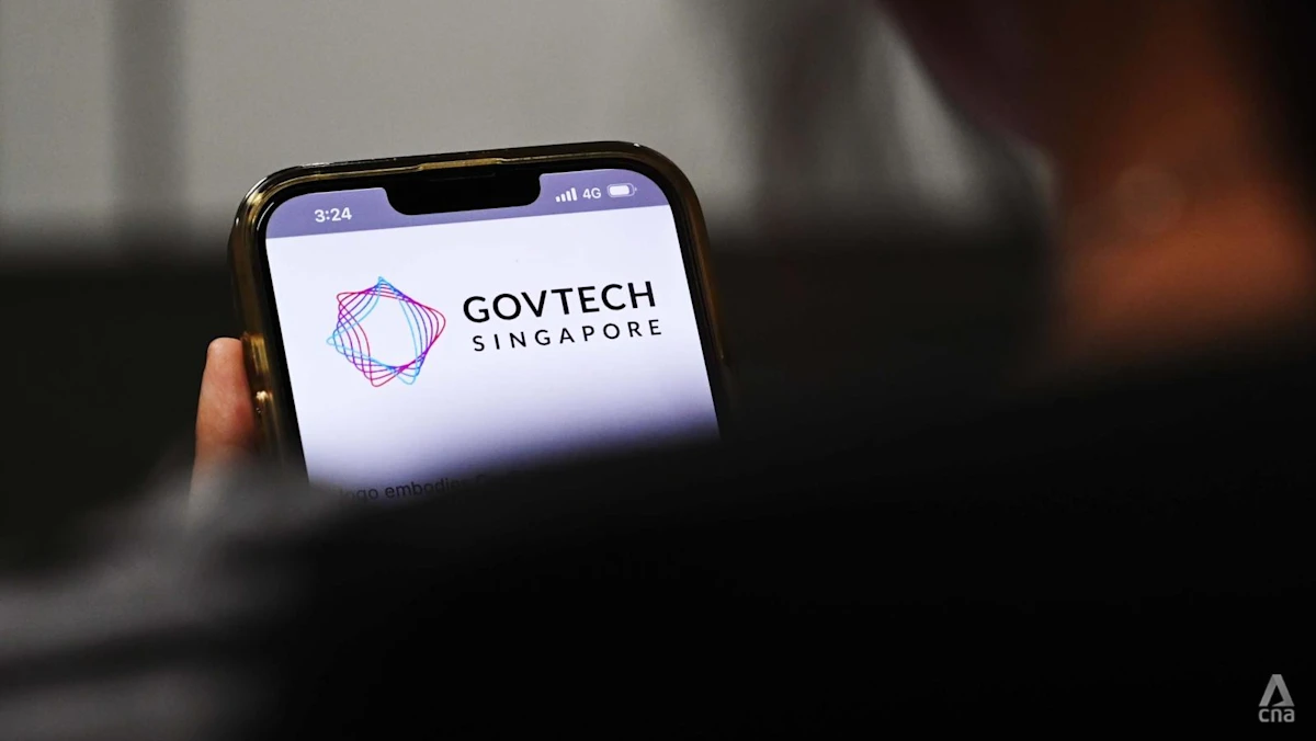 Ilustrasi logo Government Technology Agency of Singapore pada layar gawai