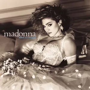Madonna tampil ikonik dengan gaun pengantin dalam album Like a Virgin