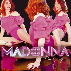 Penyanyi pop Madonna dalam balutan busana merah muda saat membawakan lagu Hung Up