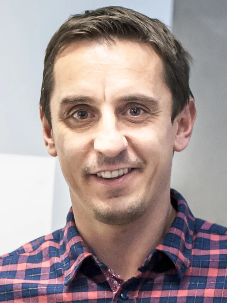 Legenda Manchester United Gary Neville saat beraksi di lapangan