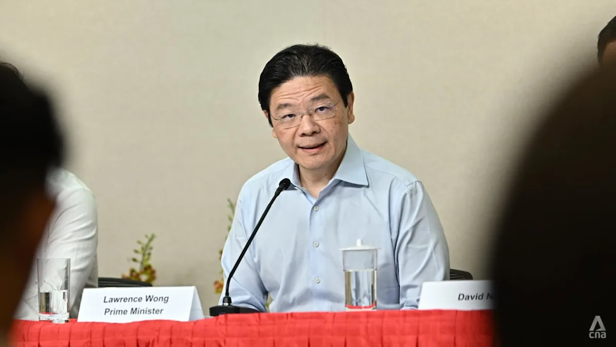 Perdana Menteri Singapura Lawrence Wong berbicara dalam konferensi pers