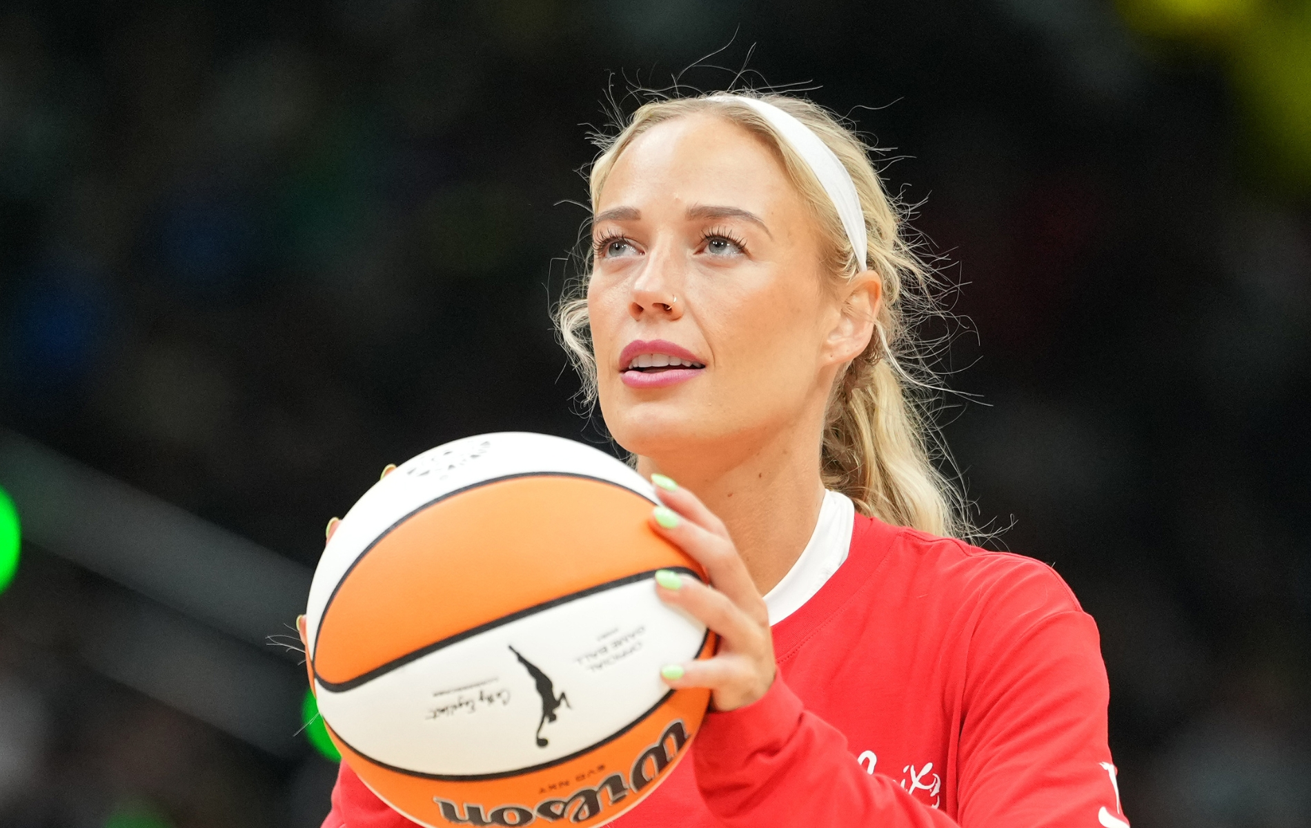 Ilustrasi pertandingan basket WNBA yang melibatkan klub Seattle Storm