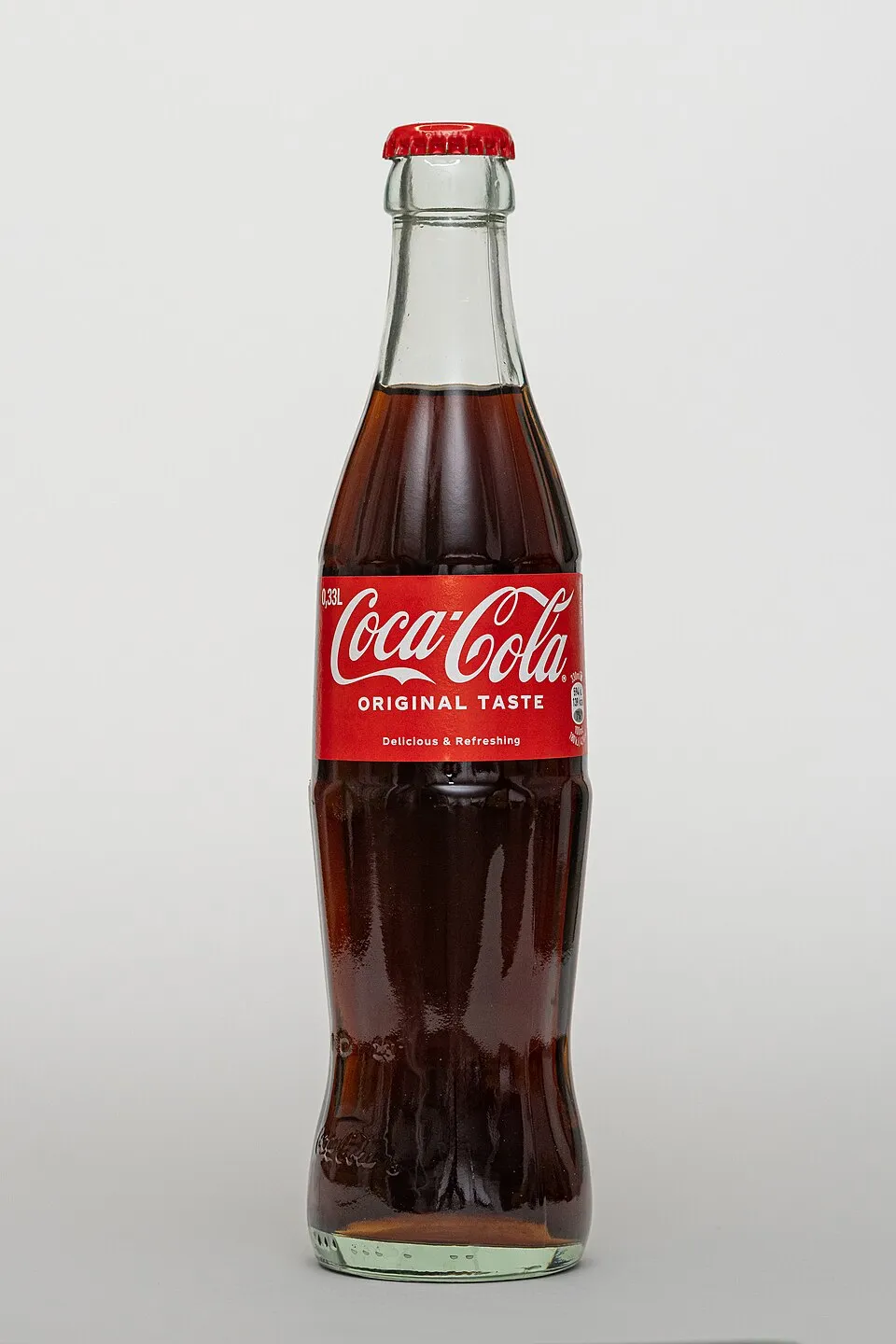 Botol dan logo klasik minuman soda Coca-Cola