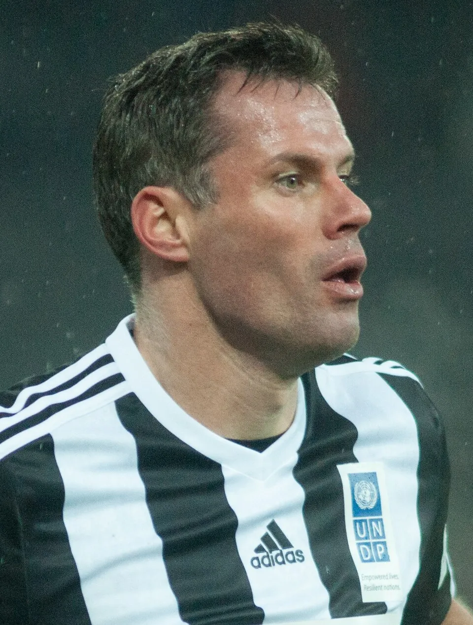 Jamie Carragher saat mengenakan seragam Liverpool di Stadion Anfield