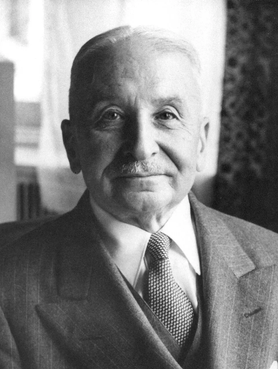 Ilustrasi profil Ludwig von Mises ekonom Mazhab Austria