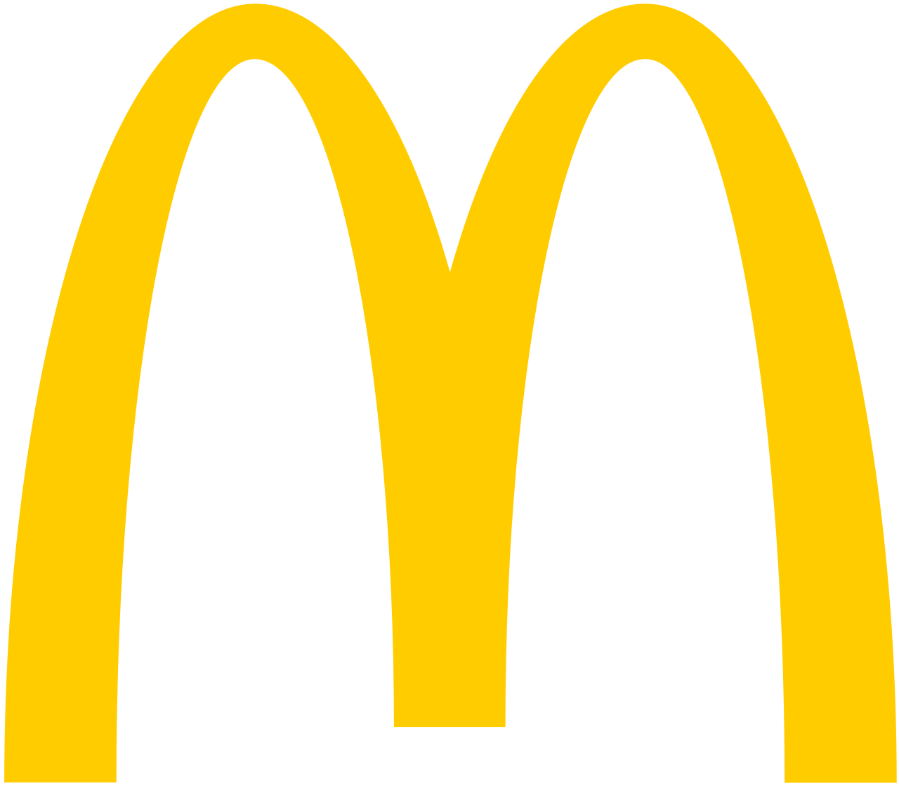 Restoran McDonald's dengan ikon Golden Arches yang khas di kawasan perkotaan
