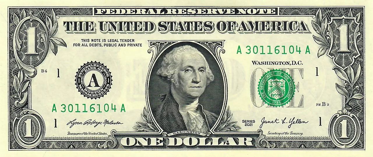 Tampak depan dan belakang uang kertas satu dolar Amerika Serikat yang menampilkan potret George Washington