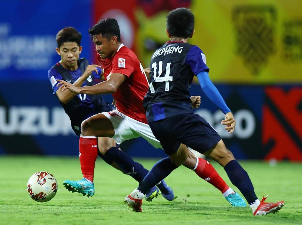 Aksi pemain Timnas Indonesia saat bertanding dalam ajang Piala AFF