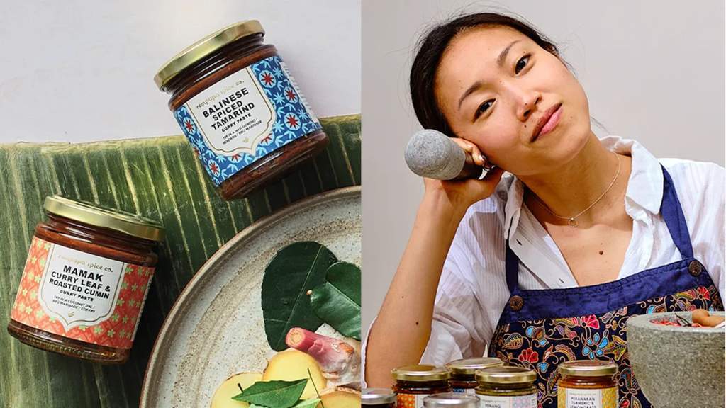 Shu Han Lee memegang produk rempah Rempapa Spice Co di London